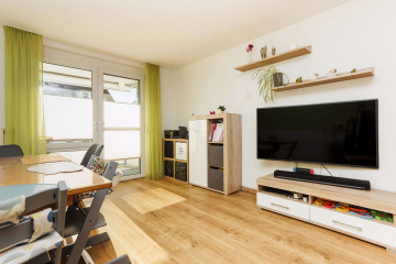 Wohnzimmer mit Essbereich - WOHNKOMFORT in Fahrnau: moderne 3-Zi.-Whg mit Balkon, Abstellkammer, Keller, Garten u. TG-Stellplatz