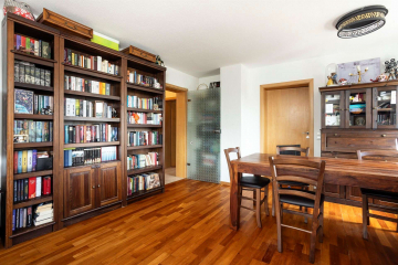 Wohnzimmer mit Essbereich - Gepflegte 4-Zimmer-Wohnung HEIMSPIEL am Grüttpark: mit Balkon, Garage & Top-Anbindung