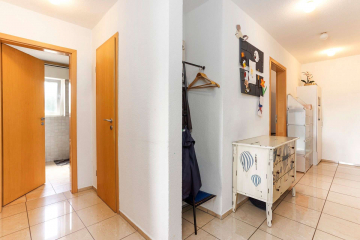 Flur - Gepflegte 4-Zimmer-Wohnung HEIMSPIEL am Grüttpark: mit Balkon, Garage & Top-Anbindung
