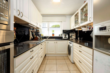 Küche - Gepflegte 4-Zimmer-Wohnung HEIMSPIEL am Grüttpark: mit Balkon, Garage & Top-Anbindung