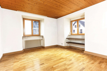 Wohnzimmer - ALTSTADTCHARME zentral in Schopfheim: 3-Zi.-Whg mit Gemeinschaftsgarten, Tageslichtbad + Stellplatz